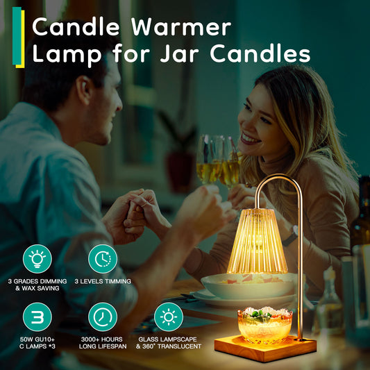 Couple enjoying dinner with warm glowing candle warmer lamp for jar candles on table