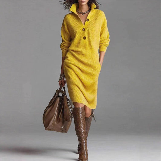 Woman wearing yellow knit sweater dress with buttons, brown knee-high boots, and carrying large brown leather bag