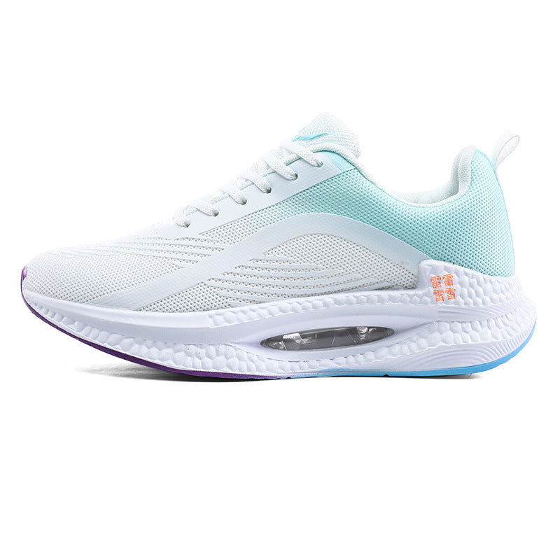 White and light blue mesh athletic sneaker with cushioned sole and visible air pocket