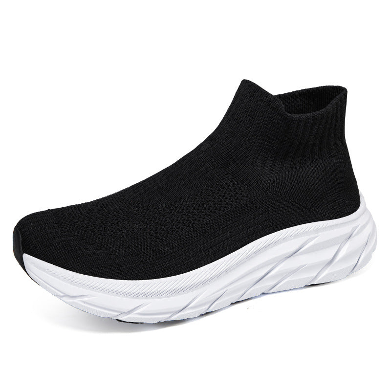Black sock-style sneaker with white chunky sole and breathable knit fabric upper