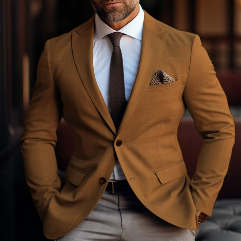 Close-up of man wearing stylish brown checkered blazer, white shirt, brown tie, and patterned pocket square