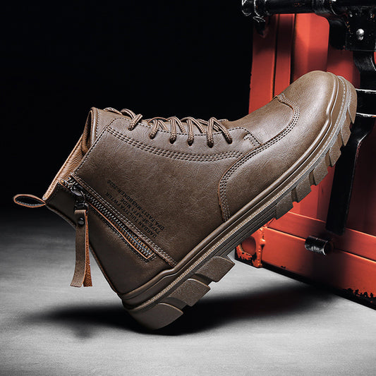 Brown leather combat boot with zipper and rugged sole against dark background and red metal surface