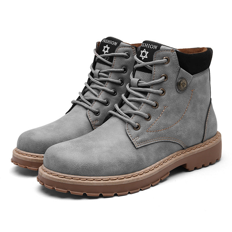 Gray suede fashion boots with brown soles and black padded collars, lace-up design