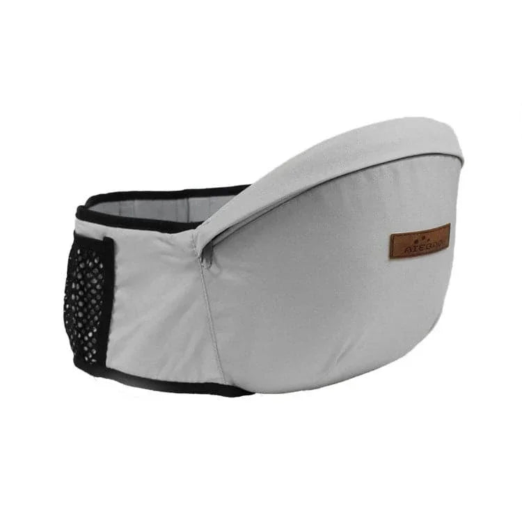 Gray fabric baby hip seat carrier with black mesh side pocket and brown logo patch