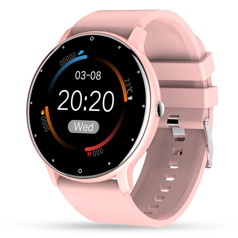 Pink round smart watch with digital display showing time, date, temperature, and fitness tracking icons