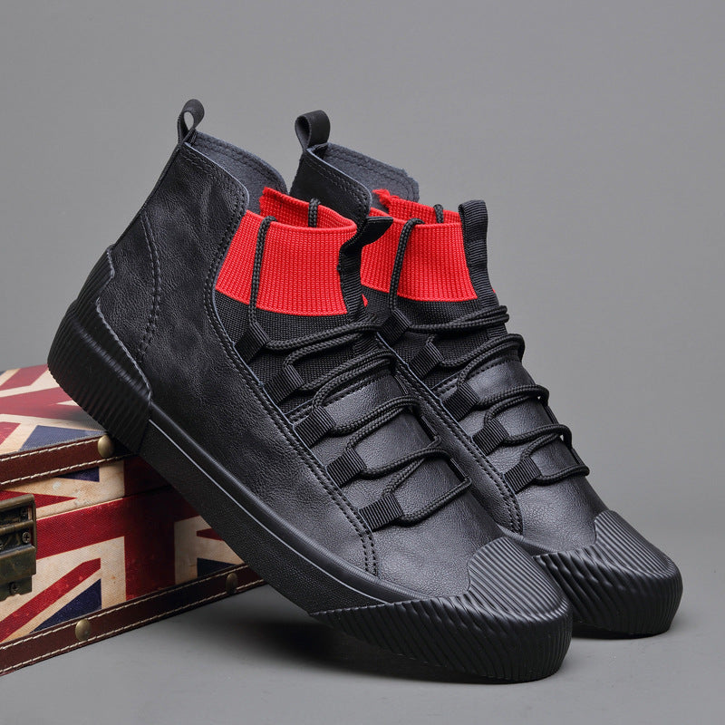 Black high-top sneakers with red elastic ankle cuffs, rubber soles, and unique lacing on gray background