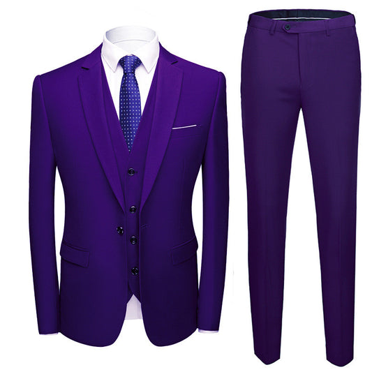 Purple three-piece men's suit with white shirt and blue polka dot tie on white background