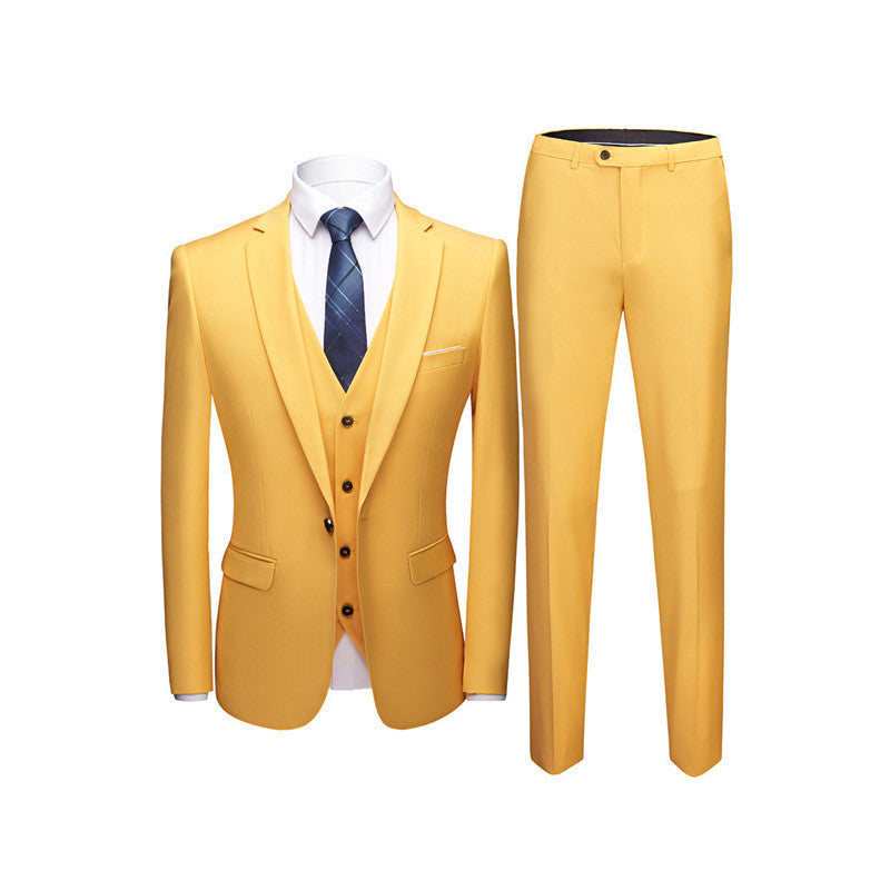 Yellow three-piece men's suit with blazer, vest, trousers, white shirt and blue tie on white background