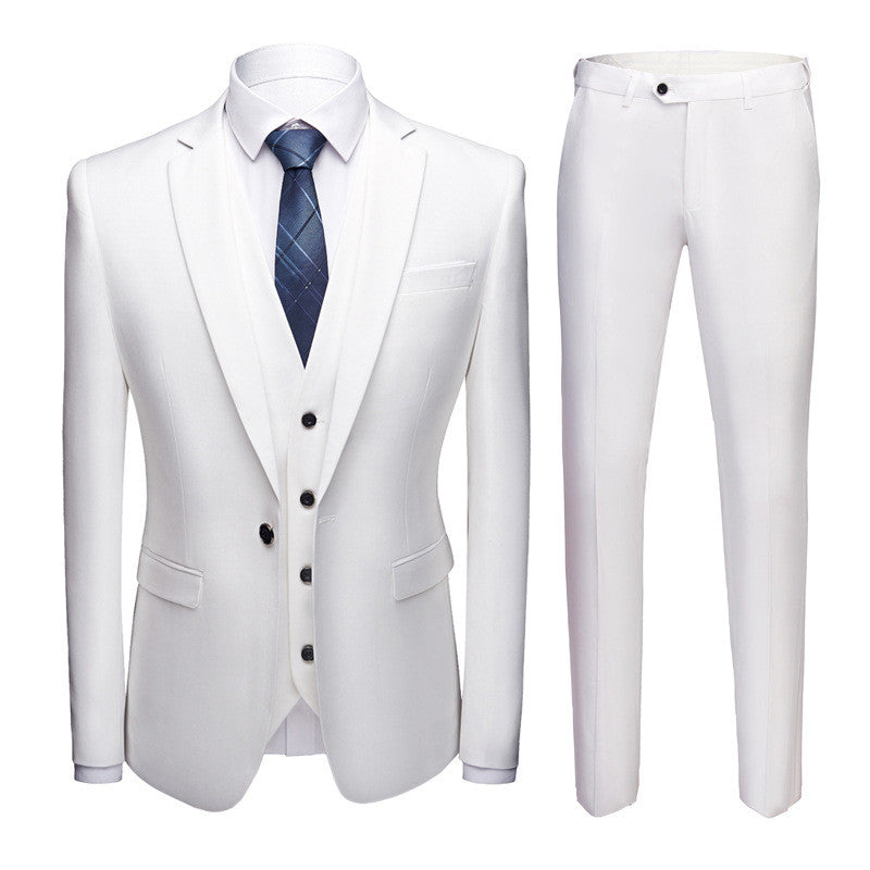 Elegant white three-piece men's suit with blazer, vest, pants, and blue checkered tie on white background
