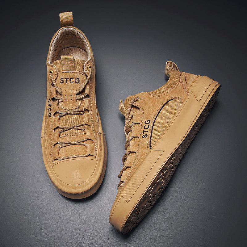 Stylish tan suede sneakers with STCG logo, rubber soles, and lace-up design on dark background