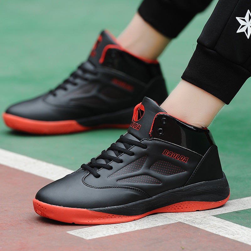 Black and red BAOLDA high-top basketball sneakers worn on a green and orange court