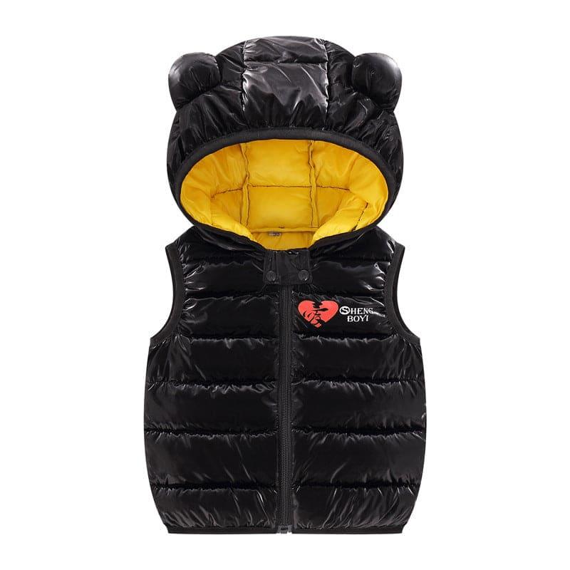 Black puffer vest for kids with bear-ear hood and yellow quilted lining, featuring red heart logo