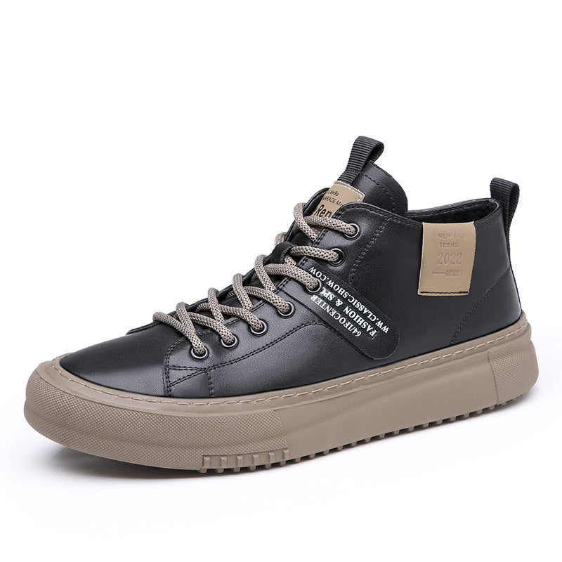 Black leather high-top sneaker with beige sole and grey laces, featuring fabric tag and pull tab