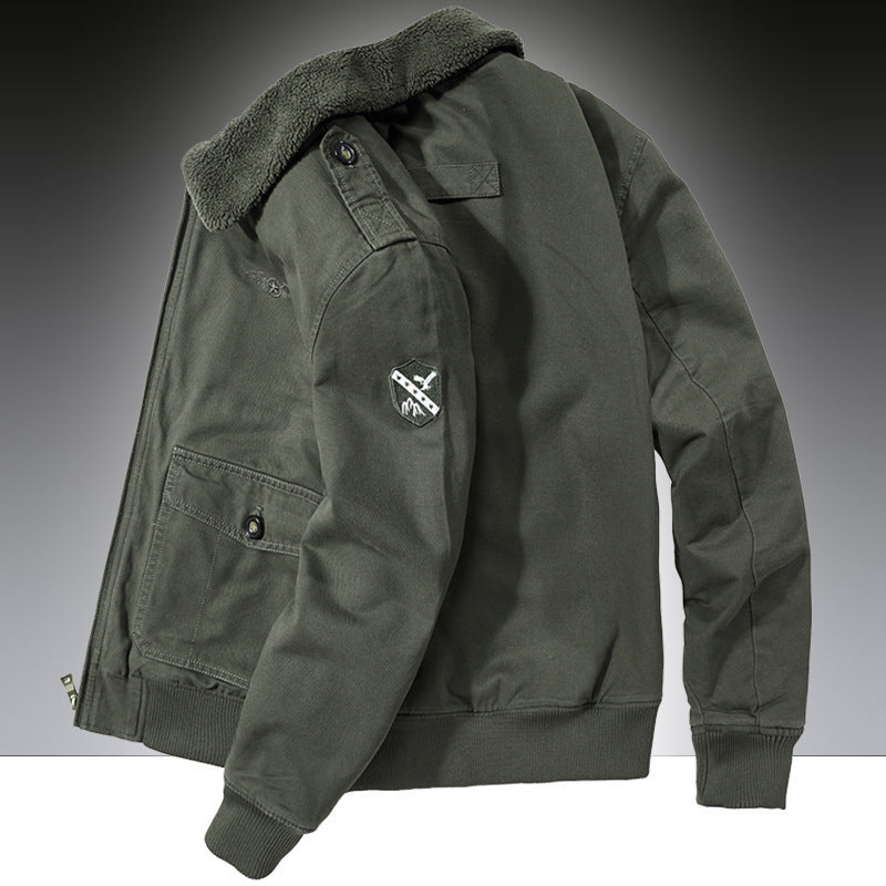 olive green bomber jacket with shearling collar and patch on sleeve, side pockets, and ribbed cuffs