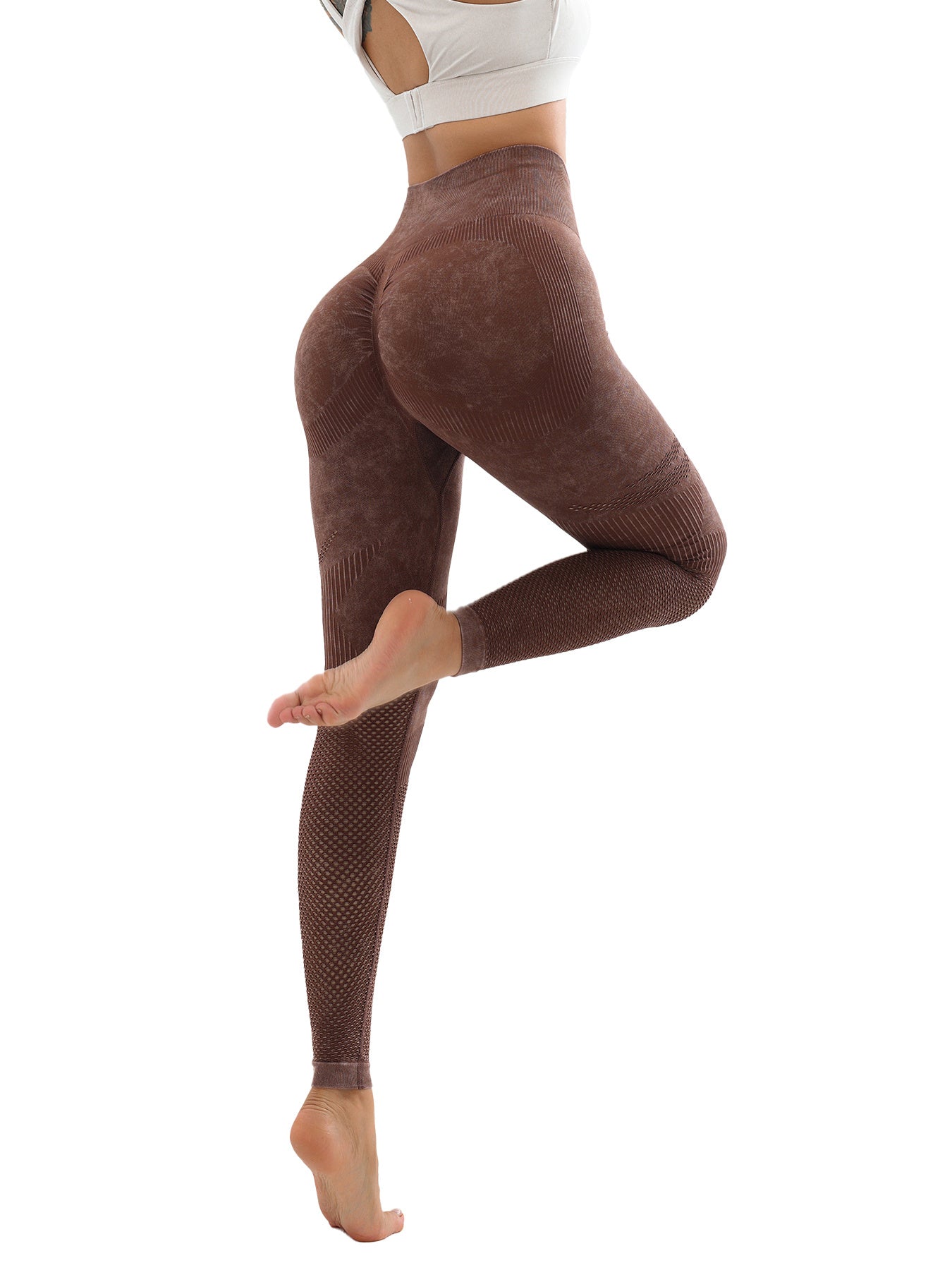Woman wearing high-waist seamless brown textured yoga leggings with tummy control and ruched booty design