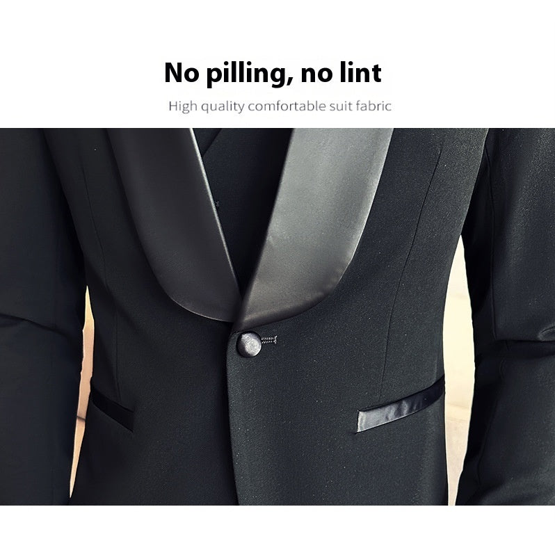 Close-up of black suit jacket with satin lapels and button, highlighting no pilling or lint fabric