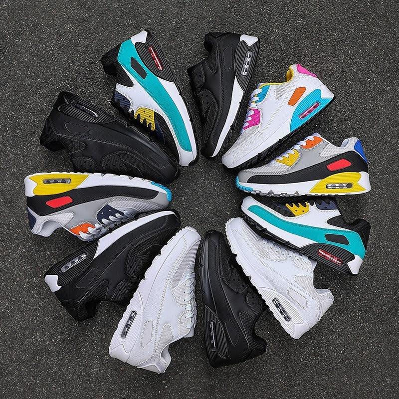 Circle of colorful and black athletic sneakers on dark asphalt background, showcasing modern running shoes