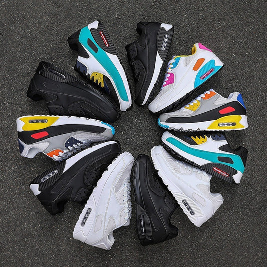 Circle of colorful and black athletic sneakers on dark asphalt background, showcasing modern running shoes