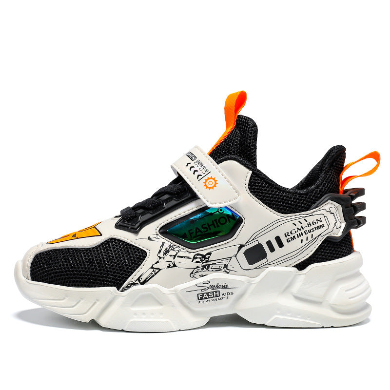 Kids black and white fashion sneakers with orange pull tabs, graphic details, and chunky sole