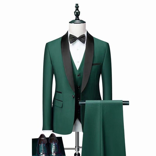 Men's three-piece dark green wedding suit with black lapel, white shirt, black bow tie, and matching pants displayed on mannequin