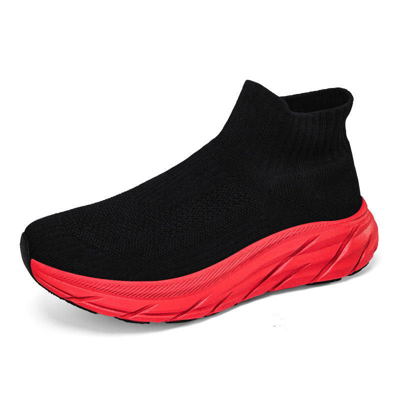 Black sock-style running shoe with red textured sole on white background