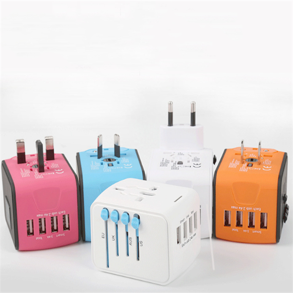 Multicolor universal travel power adapters with USB ports and various plug types for international use