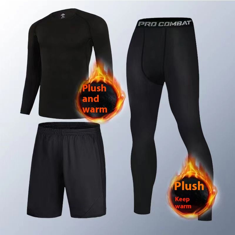 Black athletic thermal wear set including long sleeve top, shorts, and Pro Combat leggings with plush warm fabric highlights