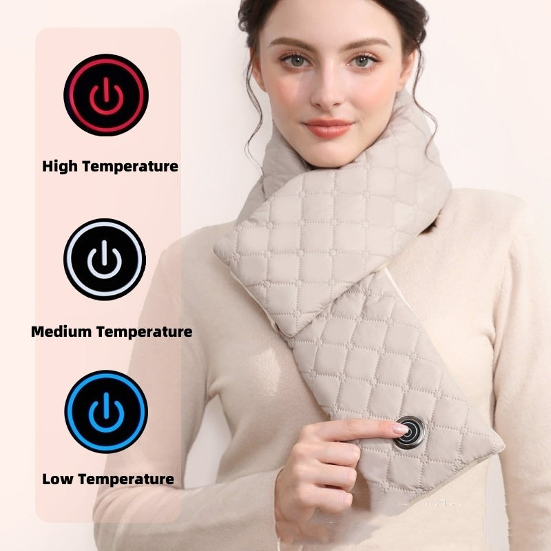Woman wearing beige quilted heated scarf with temperature control buttons for high, medium, and low heat settings