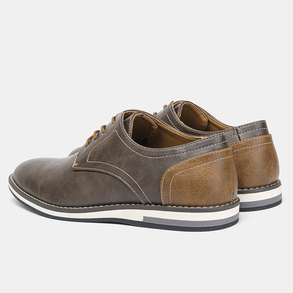 Casual men's lace-up shoes with gray front and brown heel accents on white background