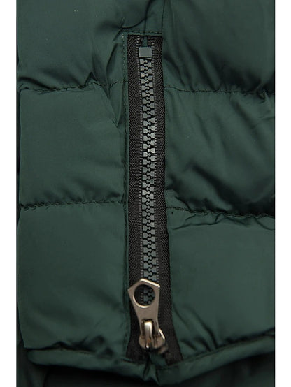 Abrigo acolchado de algodón con cremallera oblicua de largo medio con capucha de felpa para mujer