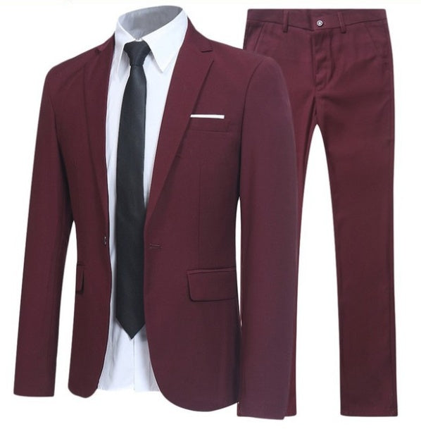 Men's burgundy suit with blazer, white dress shirt, black tie, and matching trousers