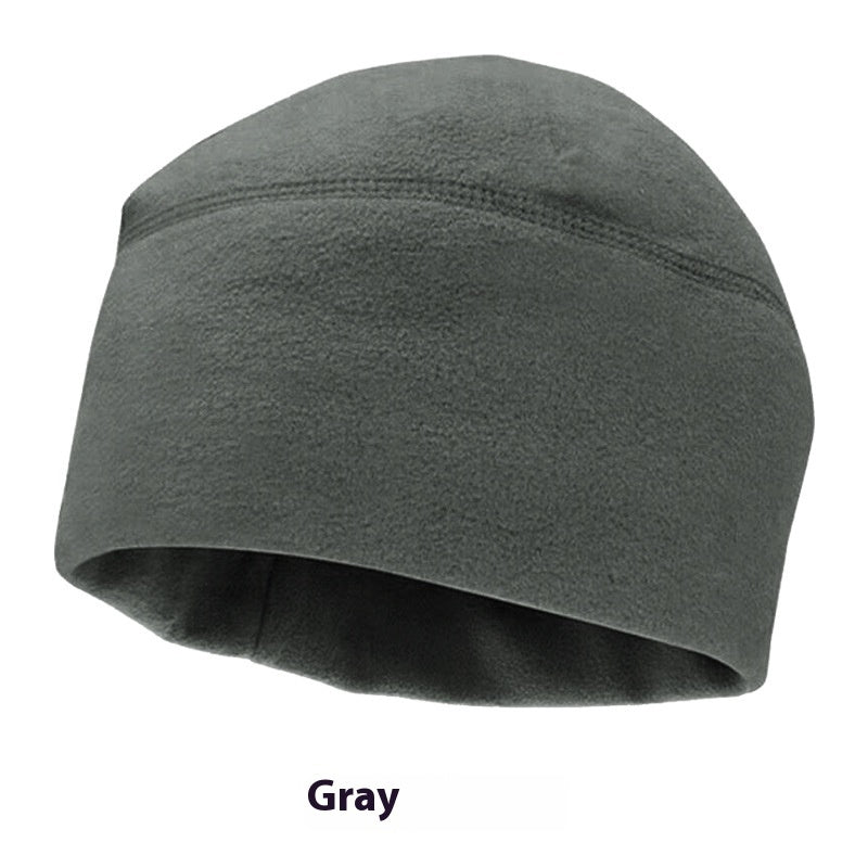 Gray fleece beanie hat with soft texture and stitched seams, winter headwear
