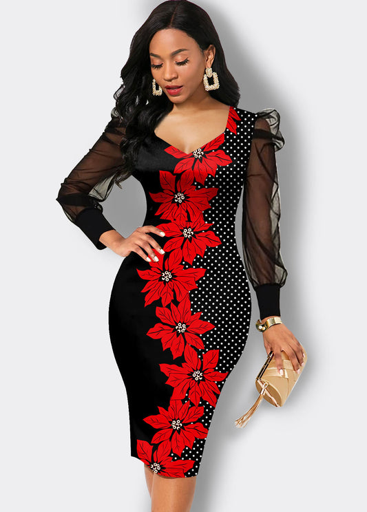 Woman in fitted black dress with red floral and white polka dot design, sheer puff sleeves, holding gold clutch