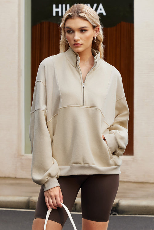 Solid Half-Zip Reverse Seam Pocketed Sweatshirt