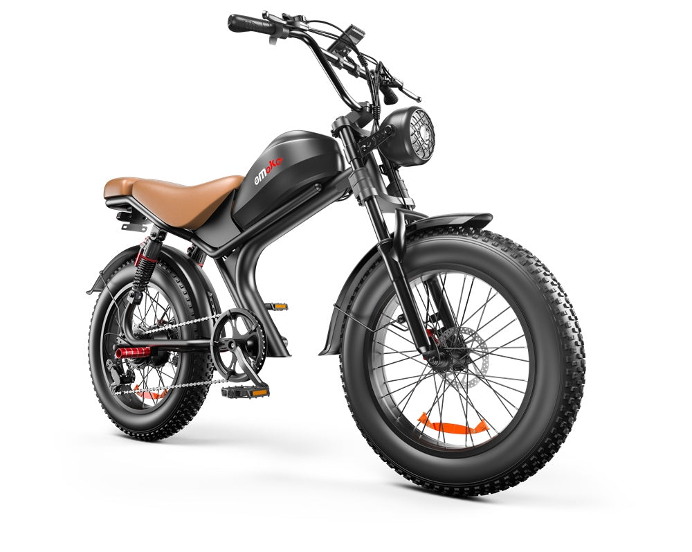 Black fat tire electric bike with brown leather seat, front headlight, and emoka logo on frame