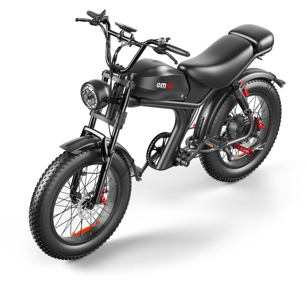 Black emoto electric bike with fat tires, retro style headlight, and red brake calipers on white background
