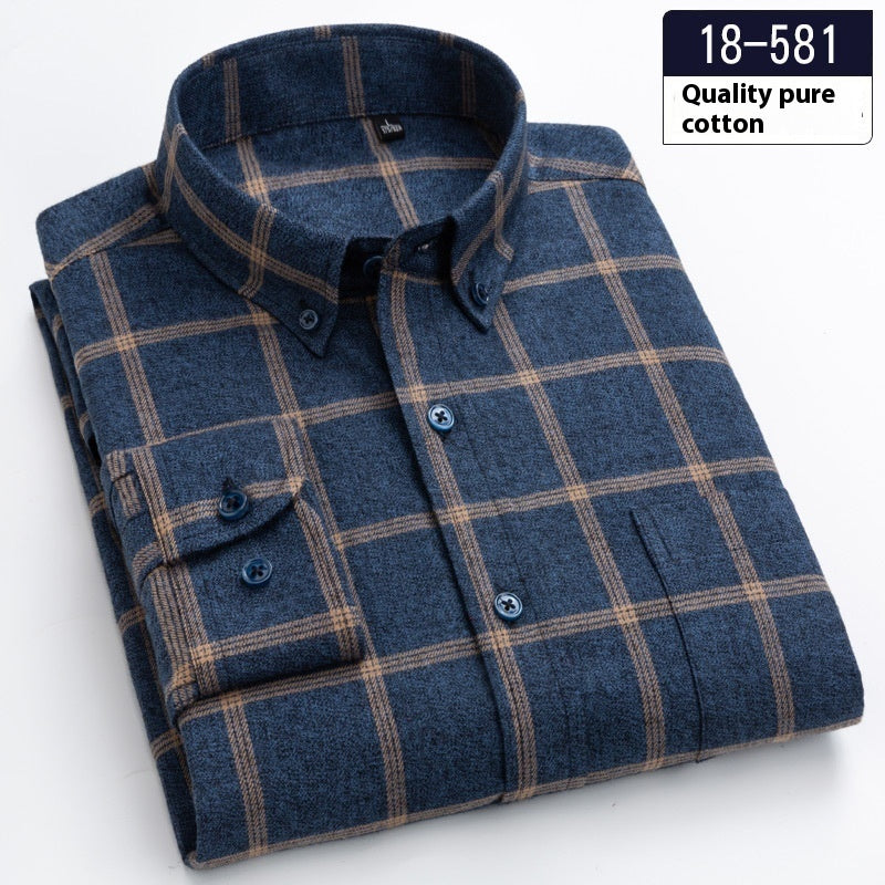 Folded blue plaid button-up shirt with beige check pattern made of quality pure cotton