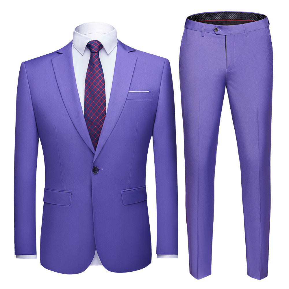Purple men's suit jacket and matching trousers with white shirt and navy red checkered tie