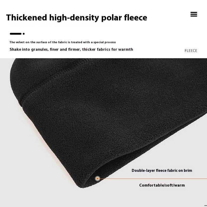 Close-up of black thickened high-density polar fleece fabric with double-layer brim for warmth