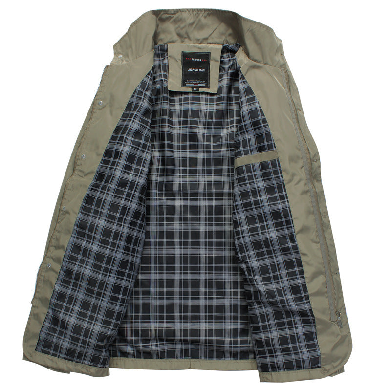 Beige jacket with black and white plaid interior lining, medium size label visible