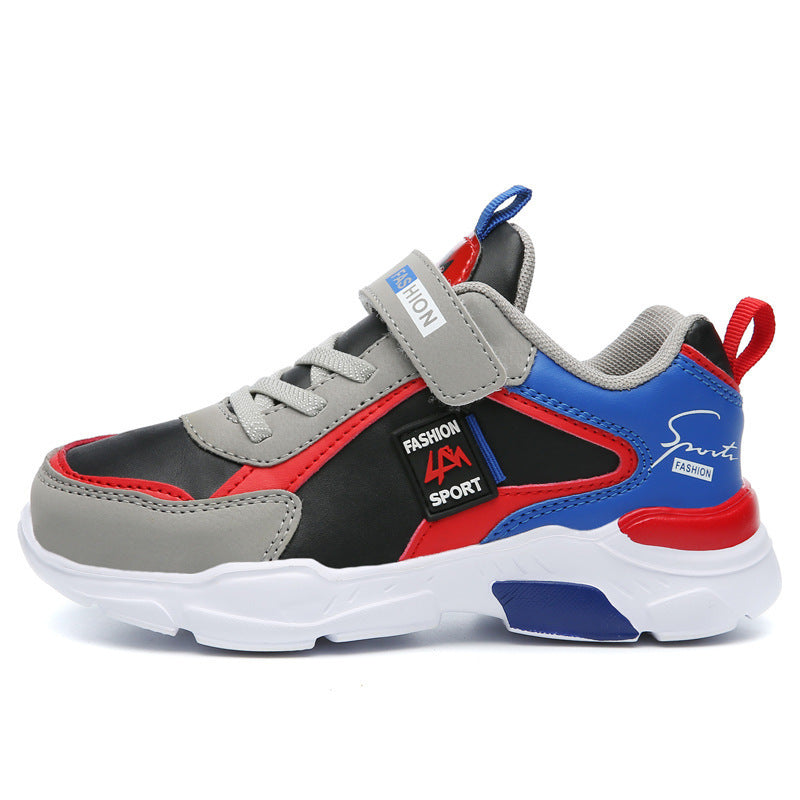 Stylish kids' sport sneaker in black, grey, red, and blue with velcro strap and white sole