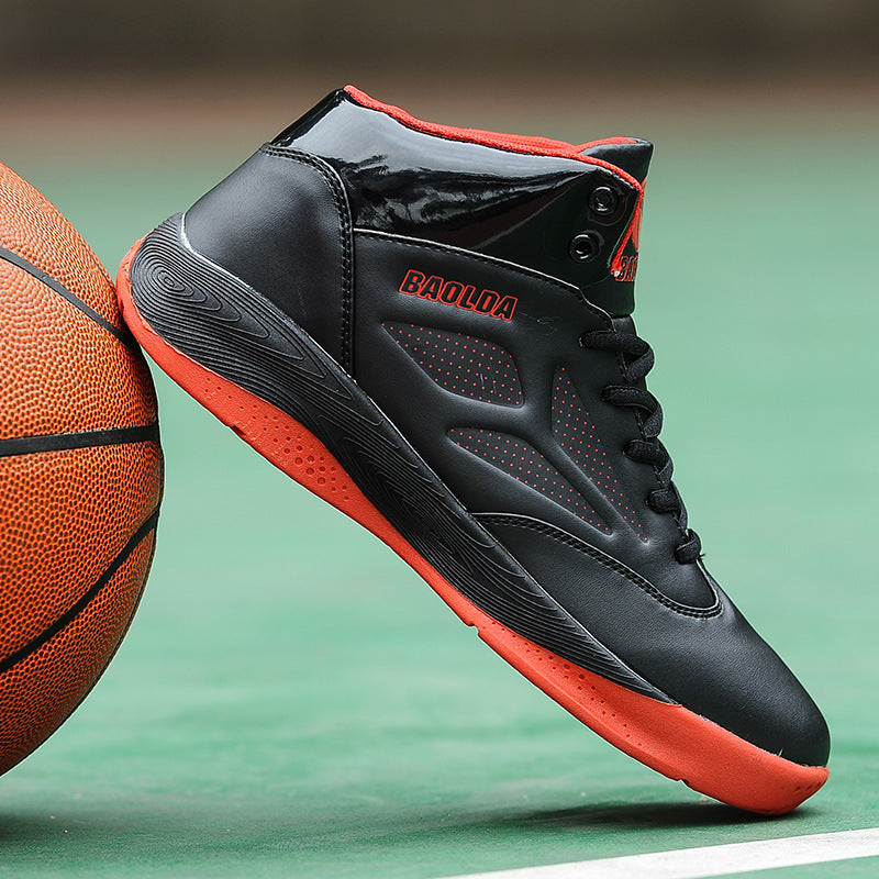 Black and red Baolda basketball shoe beside an orange basketball on green court