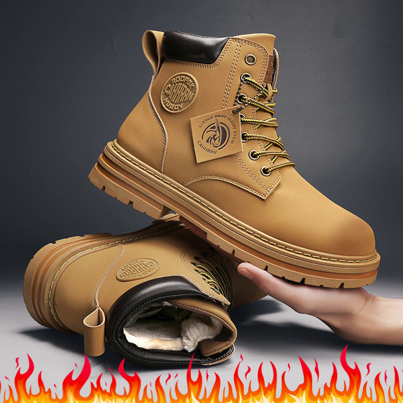 tan leather winter boots with fleece lining and sturdy soles against gray background