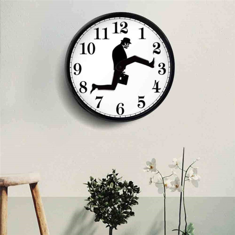 Wall clock with silhouette of man in a suit and hat as clock hands, modern living room decor