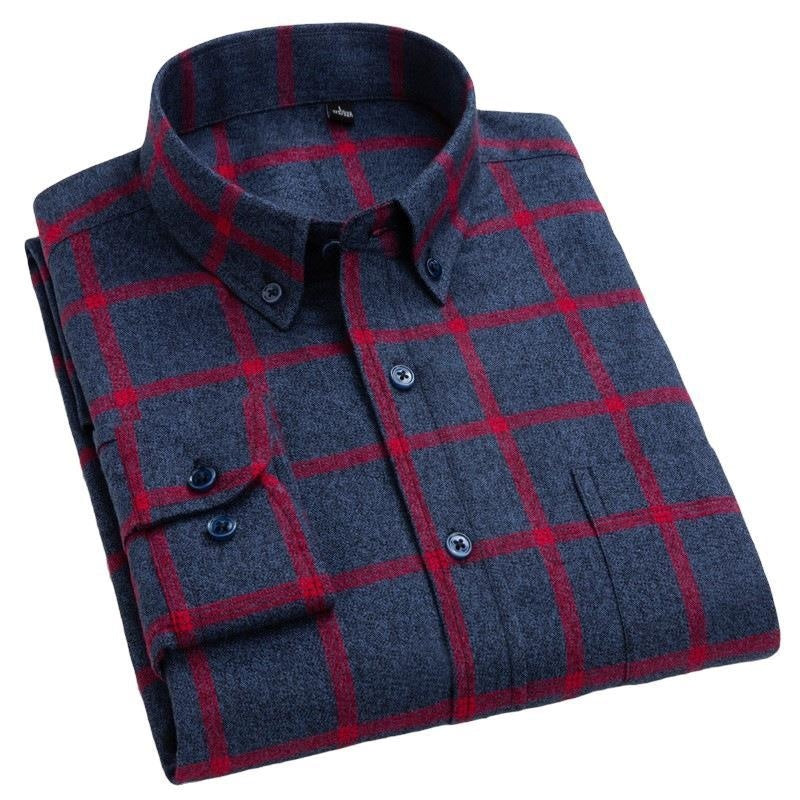 Folded navy blue flannel shirt with red checkered pattern and button-down collar