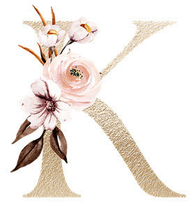 Gold metallic letter K adorned with pink and white watercolor flowers and brown leaves
