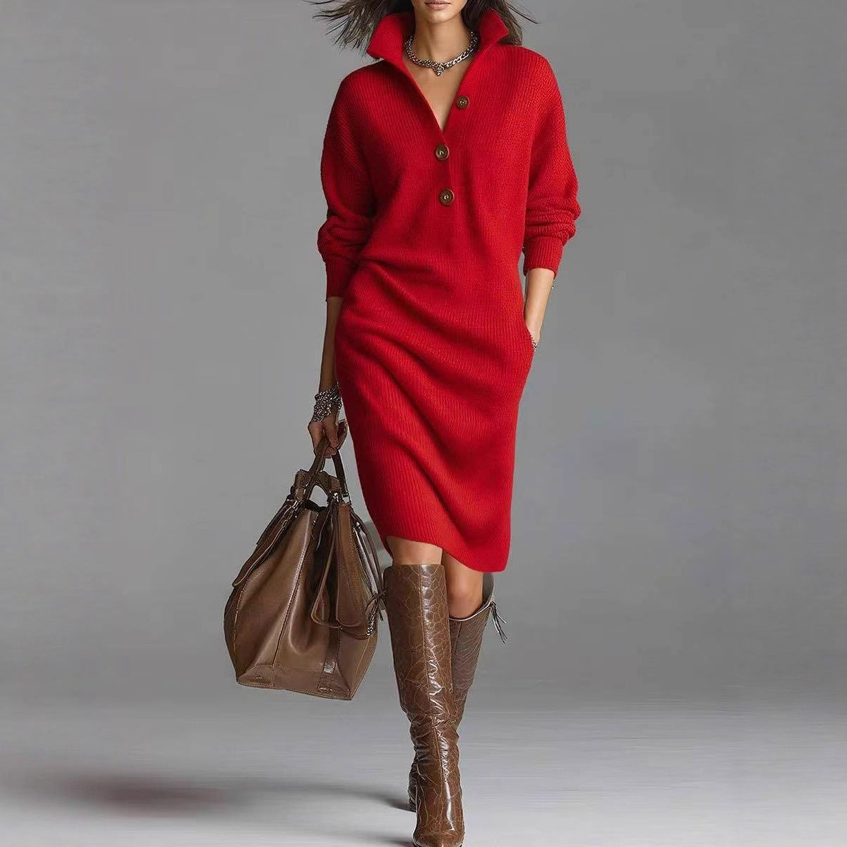 Woman wearing a red knit buttoned sweater dress with tall brown leather boots and carrying a brown leather handbag