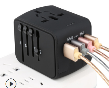 Black universal travel adapter with interchangeable plugs for EU, UK, AUS, US and 3 USB charging ports