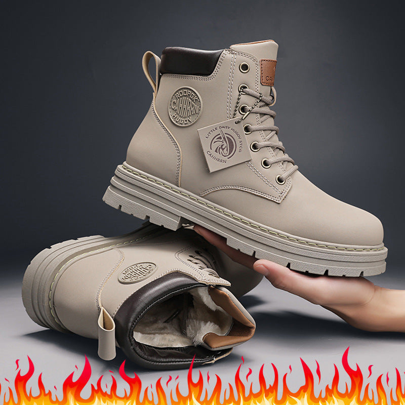 Beige winter boots with fur lining, thick soles, and lace-up design held above ground on dark background