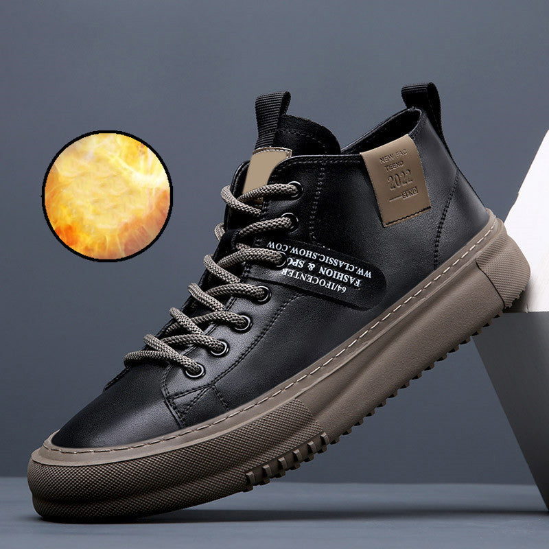 Black leather high-top sneaker with beige sole, gray laces, and fashion label patch on side